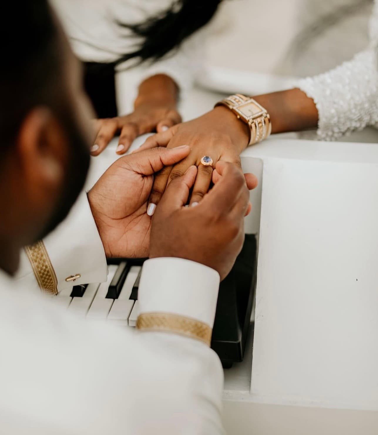 Hands with wedding rings