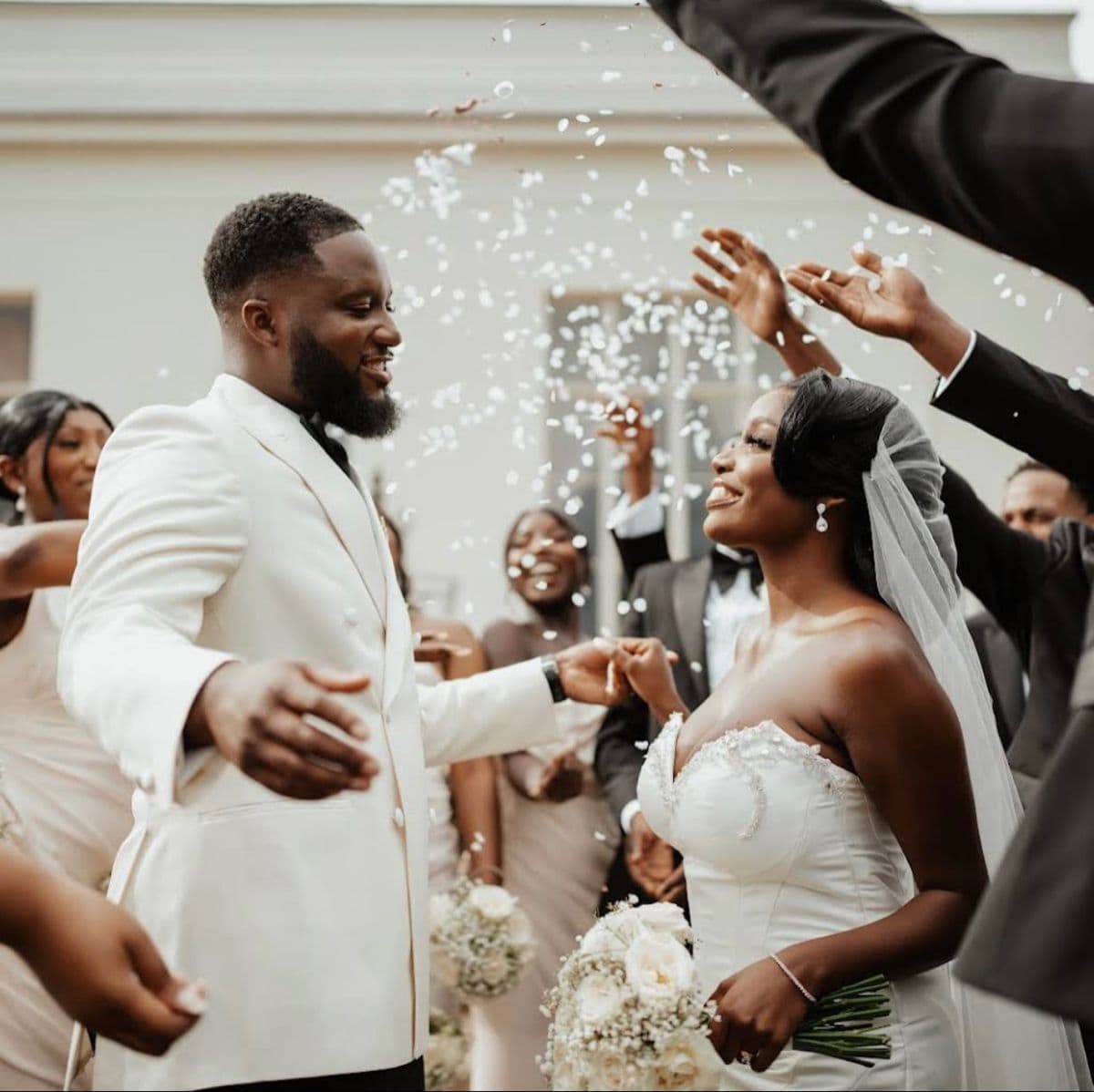 A couple celebrating with their guests